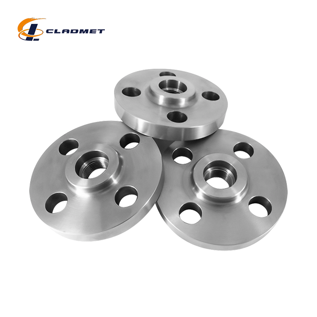 Titanium-carbon steel clad flanges